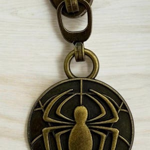 Spider Masked Hero Zipper Pull | 1in Double-Sided Metal Charm | Antique Bronze | Fan Gift