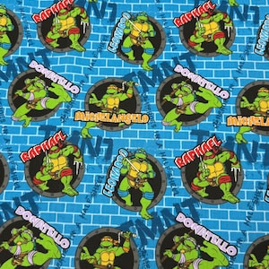 Tessuto di cotone Teenage Mutant Ninja Turtles TMNT Le Tartarughe non passano mai di moda 2015 Viacom Int Springs Creative Products Stile CP54351