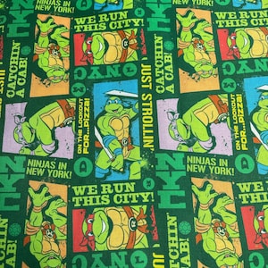 Tessuto di cotone Teenage Mutant Ninja Turtle Run This City Viacom International Springs Creative Products Stile CP 75103