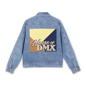 May include: A light blue denim jacket featuring a large rectangular back patch with a color-blocked design in cream, navy, and brown. The patch displays the text House of DMX in a stylized, rhinestone-encrusted font across the center.