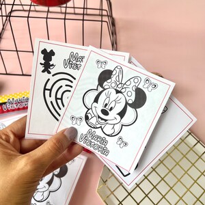 May include: Four black and white coloring pages featuring a cartoon mouse with a bow. The pages are labeled "Maria Victoria" and include butterflies.