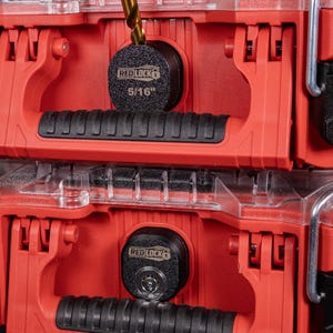 May include: Two stacked red toolboxes with black accents and clear lids. Each toolbox has a black handle and a black lock with the text "RED LOCK" and "5/16". The toolboxes are designed for storage.