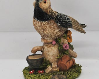 A Resin Bird with Pump