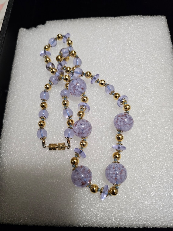 Lavender glass bead and lampwork necklace.