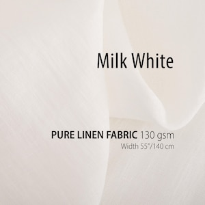 Puede incluir: Primer plano de una tela de lino blanco con el texto "Milk White". La tela está etiquetada como lino puro, 130 gsm, y 140 cm de ancho (55 pulgadas). La tela tiene un aspecto suave y texturizado.