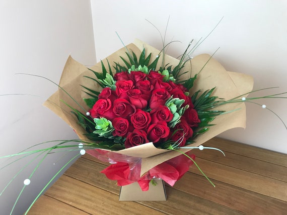 Send a Bunch of 10 Red Roses Bouquet Flower Online, Price Rs.595