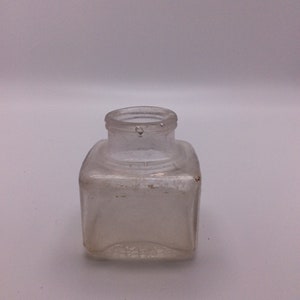 Bottiglia d'inchiostro di Carter n. 179 Vetro trasparente goffrato Prodotto negli Stati Uniti VintageFindsFound Parte superiore in sughero goffrata sul fondo Vaso quadrato da 2 1/2" Vintage