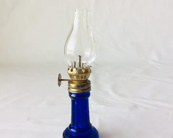 Mini Cobalt Oil Lamp with Clear Chimney Made in Hong Kong VintageFindsFound MCM Decorative Victorian Decor