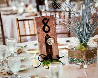 Antique door knob and barn board table numbers