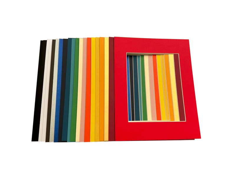May include: A set of 20 different coloured mount boards, each measuring 8x10 inches. The mount boards are arranged in a rainbow pattern, with the colours ranging from black to red. The mount boards are all made of high-quality acid-free paper.