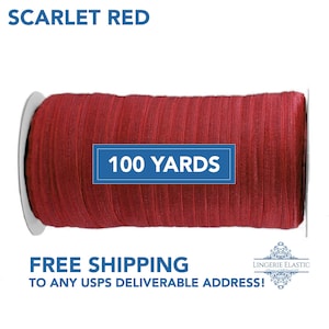 May include: Scarlet red lingerie elastic ribbon on a white spool. The ribbon is 100 yards long. The text "SCARLET RED" is at the top of the image. The text "100 YARDS" is on a blue rectangle.