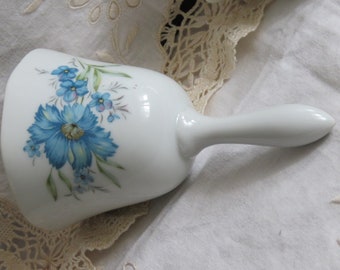 Vintage Collectable Made in Japan white ceramic bell with blue flowers