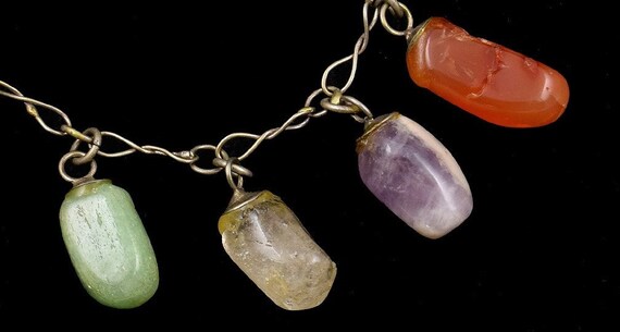 Shining Bracelet of Polished Natural Rock Crystals Purple, Red, Green, Clear View 2