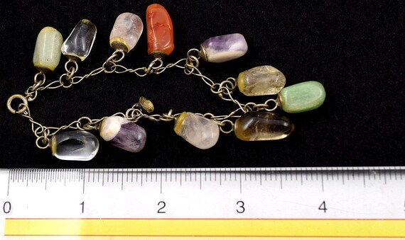 Shining Bracelet of Polished Natural Rock Crystals Purple, Red, Green, Clear View 3