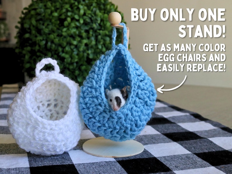 May include: Two crocheted hanging beds for small pets, one white and one blue. The blue bed has a small white and black pet inside. The text on the image reads "BUY ONLY ONE STAND! GET AS MANY COLOR EGG CHAIRS AND EASILY REPLACE!"