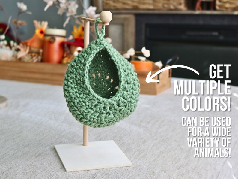 May include: A green crocheted hanging pet bed with a wooden stand. Get multiple colors! Can be used for a wide variety of animals!