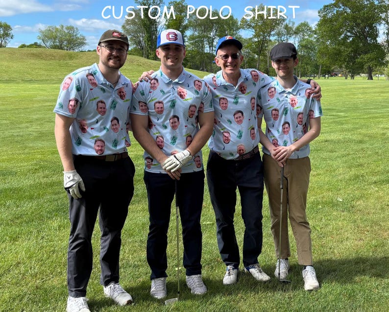May include: Four people wearing light blue polo shirts with a repeating pattern of faces. The shirts have short sleeves and a collared neckline. The text "CUSTOM POLO SHIRT" is at the top of the image. The group is standing on a green grassy field.