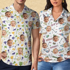 May include: White polo shirts with a golf-themed pattern. The shirts feature a repeating design of golf clubs, flags, and baby faces. Text includes "FORE!", "PAR", "EAGLE!", "BOGEY!", "HOLE ONE!", and "BIRDIE!"
