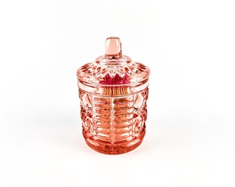 Azucarero de cristal rosa con forma de cerilla
