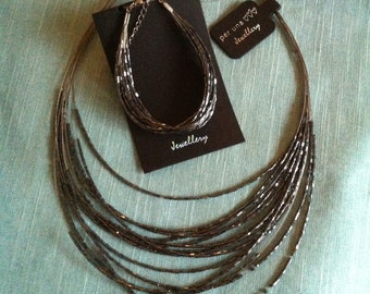 Per Una Jewelry Set: Gunmetal Crystal Illusion Necklace & Bracelet