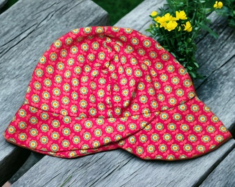 Sun hat with sun protection at the front and back with a brim with a flower motif, head circumference 50/52