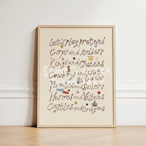 May include: A framed wall art print on a cream background featuring dark brown cursive text that reads: let's play pretend, Cops and Robbers, Kings and Queens, Cowboys and Outlaws, Pirates and Sailors, Heroes and Villains, Castles and Dragons.