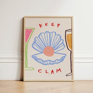 May include: A framed illustration with the text "KEEP CLAM" in red. The illustration features two glasses of pink and yellow liquid, and a blue seashell with a pink pearl inside.