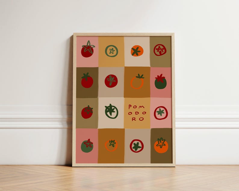 May include: A framed print featuring a grid of colorful tomato illustrations. Each square showcases a different tomato design in shades of red, green, and orange, set against a backdrop of pink, tan, and brown squares. The word "POMODORO" is also displayed.