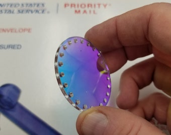 Iridescent color shifting lenses