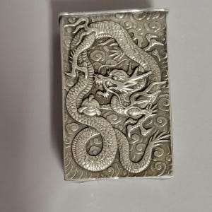 Chinese Export Silver Dragon Matchbook Cover by Wang Hing (c. 1920–1930)