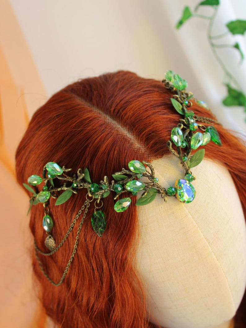 Bronze tiara with shimmering gree. Teardrop and round crystal beads, bronze dangling chains and deep green leaf shaped beads