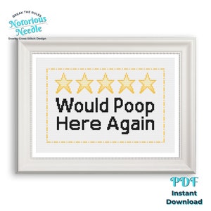 May include: A white framed cross stitch design with five yellow stars and the text "Would Poop Here Again".