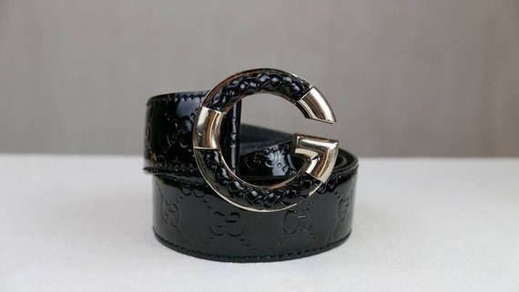 Black Gucci patent leather monogram belt