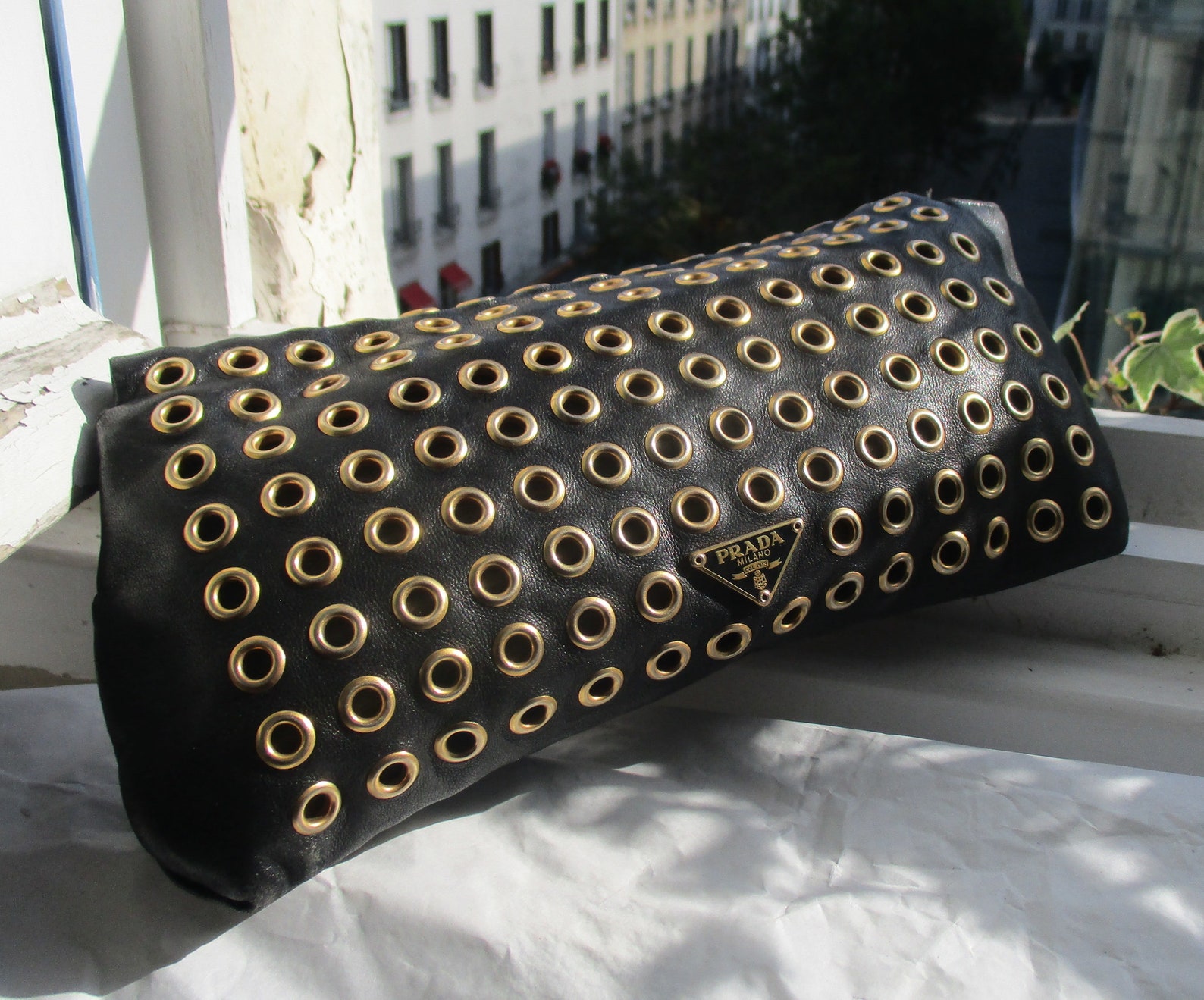 prada triangle logo clutch