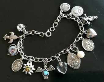 Antique Guardian Silver Bracelet with Angels and Enamel Charms from 1900s.