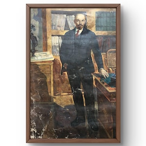 May include: A framed vintage portrait of a man in a dark suit and red tie, standing in a room with a bookcase and desk. The painting has a brown wooden frame and a vintage aesthetic.