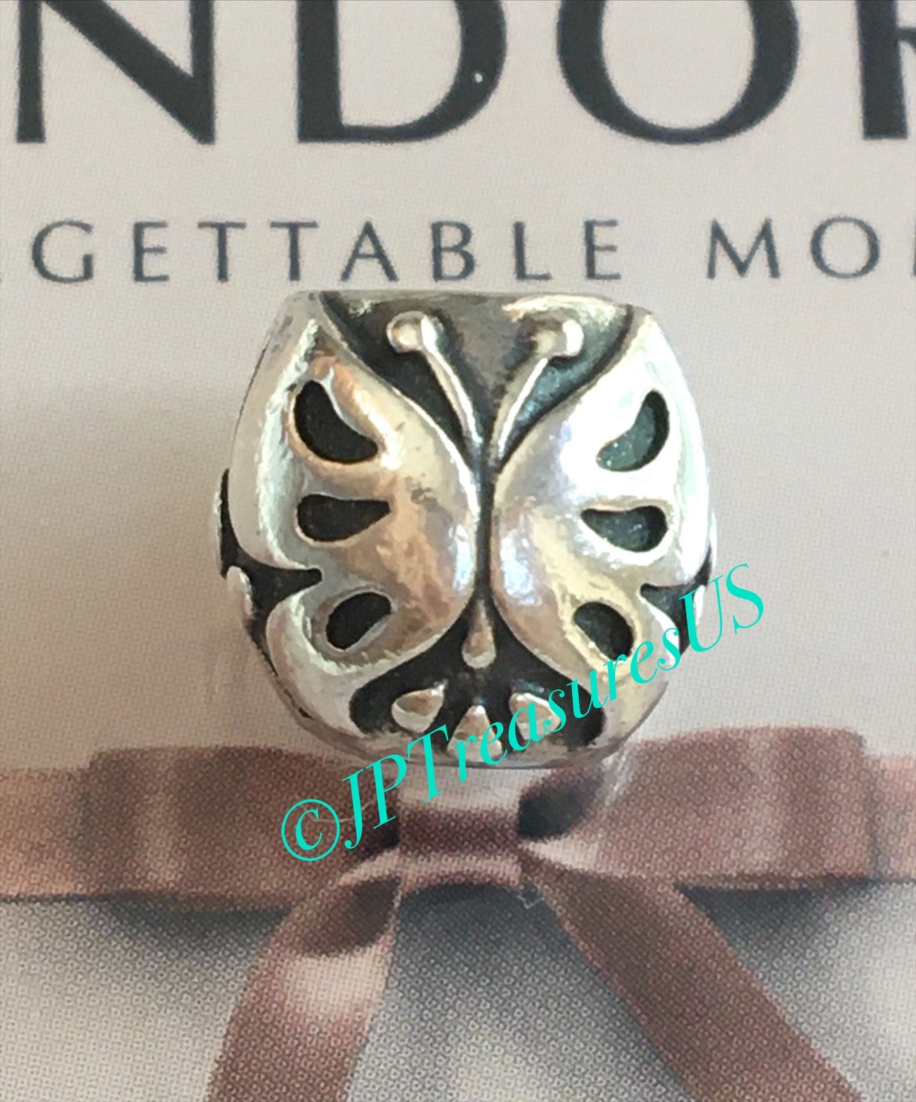 Pandora butterfly 2024 charm retired