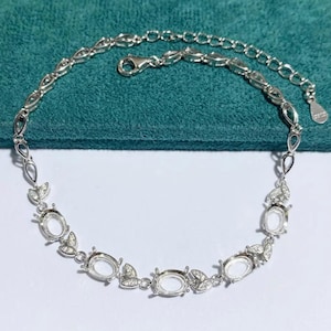 Verstellbares ovales Armband aus Sterlingsilber: 5 x 7 mm mit Weißgold beschichtet