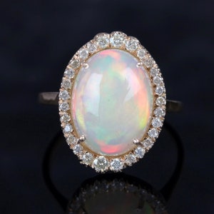 14k Yellow Gold Ethiopian Opal Diamond Halo Ring