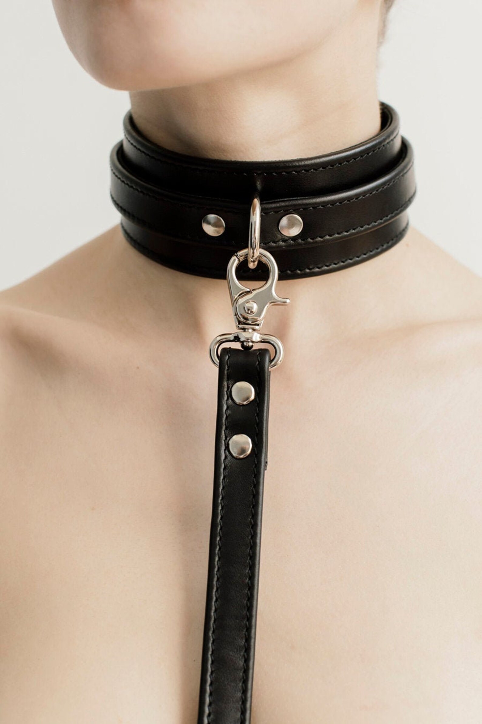 Leather BDSM collar with decorative chain