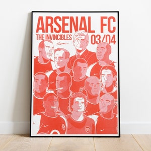 May include: A red and white poster with the text "Arsenal FC The Invincibles 03/04" and a collage of cartoon portraits of the Arsenal football team.