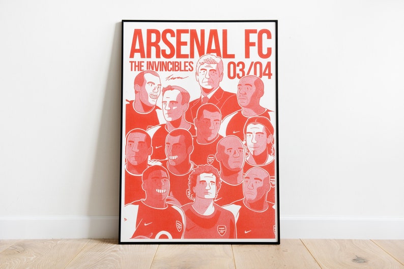 May include: A red and white poster with the text "Arsenal FC The Invincibles 03/04" and a collage of cartoon portraits of the Arsenal football team.