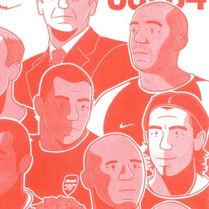 May include: A group of men in red and black uniforms, with one man in a suit. The men are all looking at the camera. The text "GOALS" is visible in the background.