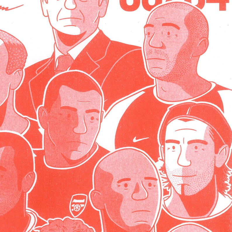 May include: A group of men in red and black uniforms, with one man in a suit. The men are all looking at the camera. The text "GOALS" is visible in the background.