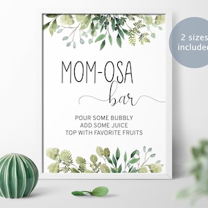 Peut inclure: Affiche imprimable pour un "Bar &agrave; Mimosas" avec un motif de feuilles vertes. L'affiche indique "Versez du p&eacute;tillant, ajoutez du jus, garnissez de vos fruits pr&eacute;f&eacute;r&eacute;s".