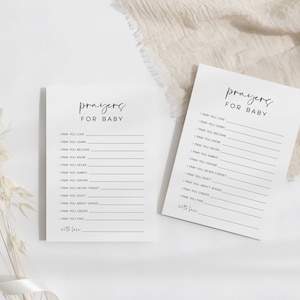 May include: Two white cards with black text that reads "Prayers for Baby". Each card has a list of prayers for a baby, such as "I pray you love", "I pray you learn", and "I pray you know".