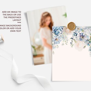 May include: A white card with a blue and white floral design and a gold wax seal. The card has a blank space for text. The background is a light pink color.