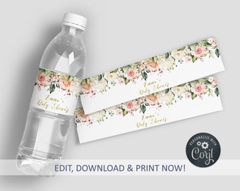 May include: Printable water bottle labels featuring a floral design in shades of pink, peach, and white. The labels include the text "Emma's Baby Shower" in gold lettering.