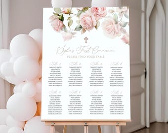 May include: A white seating chart with a floral design featuring pink roses and greenery. The chart is titled "Sophia's First Communion" and includes a list of names for each table. The text "Please Find Your Table" is printed below the title.