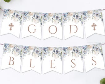 Pode incluir: Uma faixa branca com desenhos florais azuis e brancos. A faixa tem as palavras "GOD BLESS" em letras marrons com uma cruz em cada extremidade.